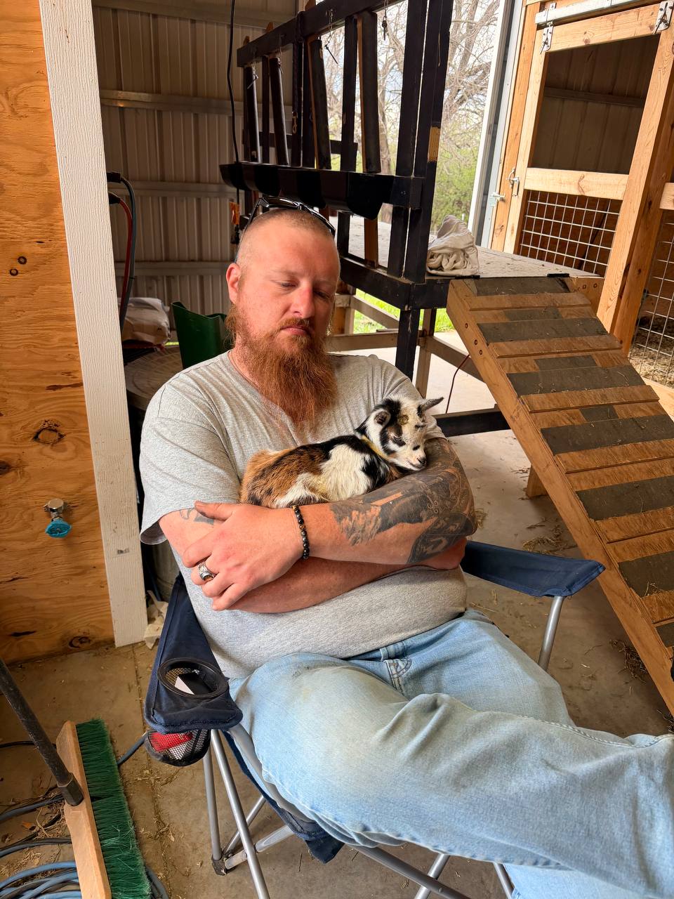 Jordan holding a bottle baby